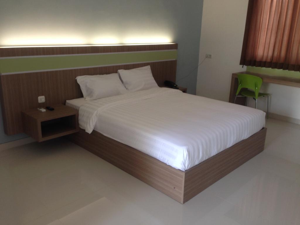 Rumah Cassa Guest House Surabaya Kamer foto