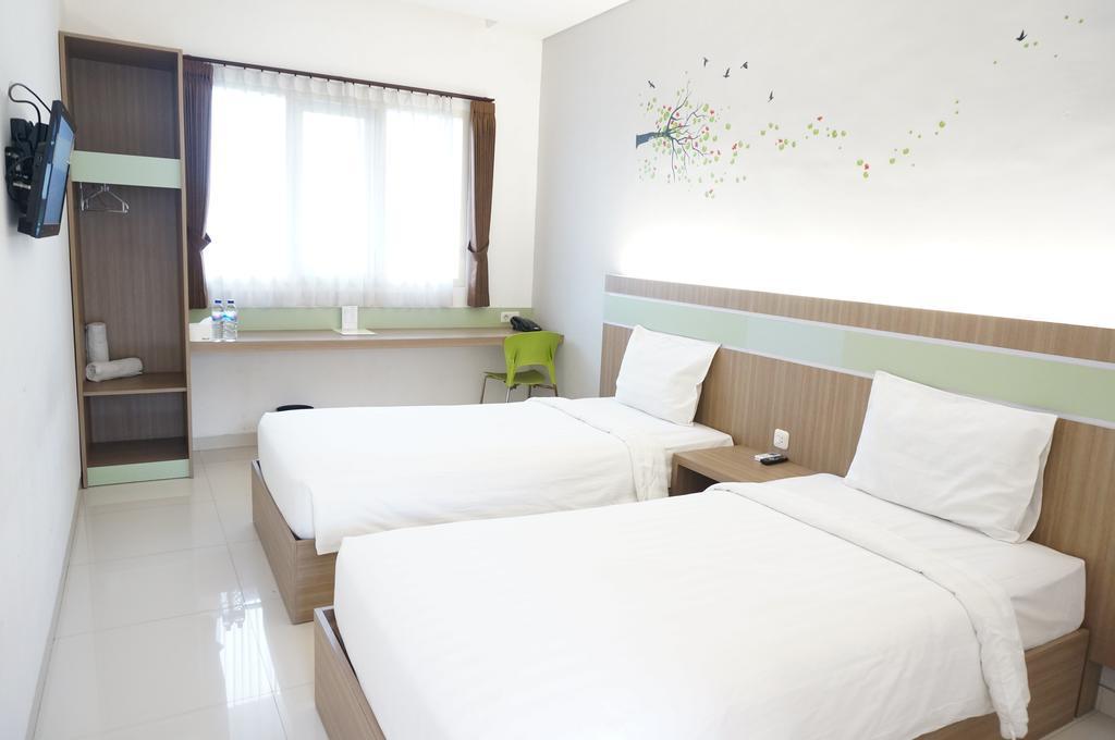 Rumah Cassa Guest House Surabaya Kamer foto